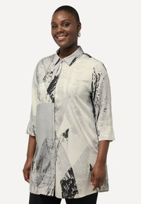 Длинная блузка Длинная блузка