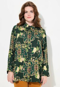 Длинная блузка