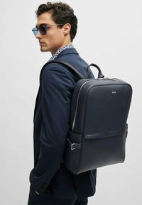 Кожаный рюкзак