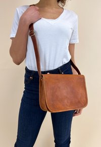 Кожаная сумка