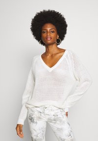 Длинный пуловер