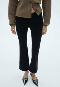 Клешеные джинсы Клешеные джинсы