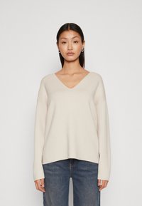 Длинный пуловер Длинный пуловер