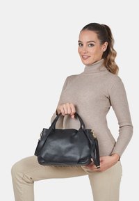 Кожаная сумка