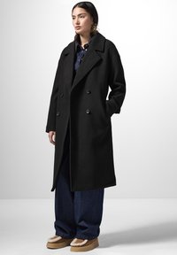 Шерстяное пальто