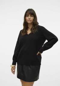 Длинный пуловер