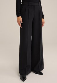 Брюки Брюки