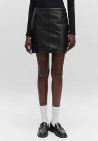 Кожаная юбка