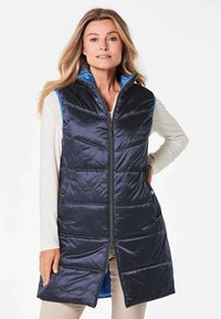 Длинный жилет