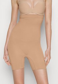 Корректирующее белье Корректирующее белье