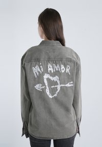 Джинсовая блузка