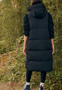 Длинный жилет Длинный жилет