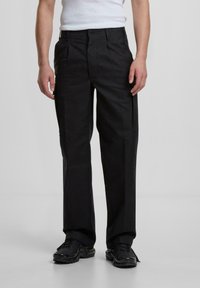 Брюки с накладными карманами Брюки с накладными карманами