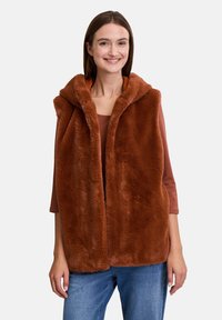 Пуховой жилет Пуховой жилет