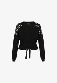 Вязаный жилет