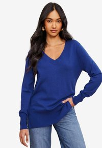 Длинный пуловер