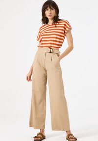 Широкие брюки Широкие брюки