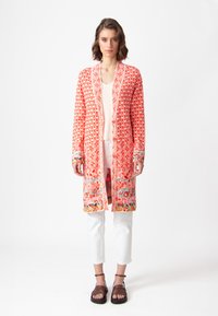 Жаккардовая вязаная кофта