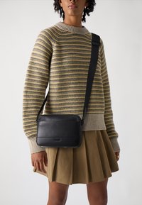 Кожаная сумка