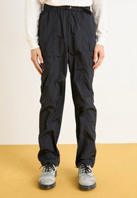 Брюки с накладными карманами Брюки с накладными карманами