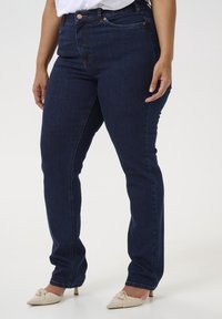 Клешеные брюки