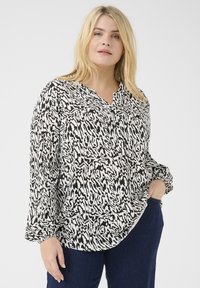 Длинная блузка