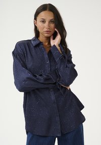 Длинная блузка