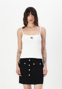 Топ на бретельках