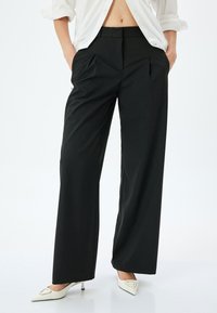 Широкие брюки Широкие брюки