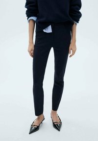 Узкие брюки