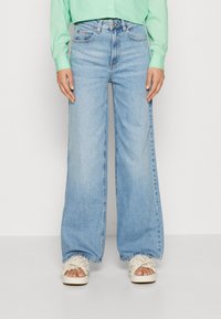 Свободные джинсы