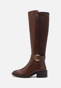 Широкие сапоги