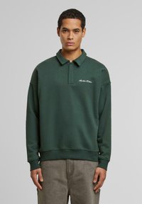 Поло с длинным рукавом