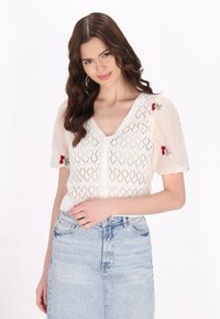 Вязаная кофта