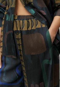 Широкие брюки Широкие брюки