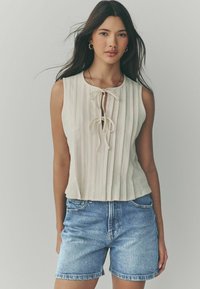 Джинсовые шорты