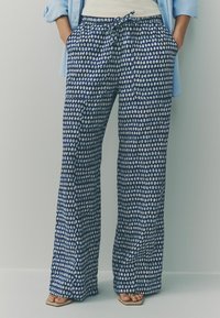 Широкие брюки Широкие брюки