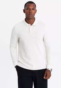 Поло с длинным рукавом