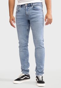 Узкие джинсы Узкие джинсы