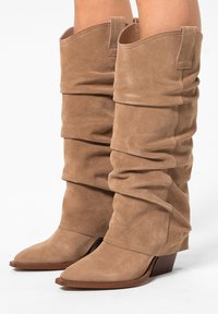 Ковбойские сапоги Ковбойские сапоги