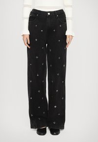 Джинсы бойфренда