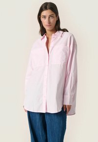 Длинная блузка