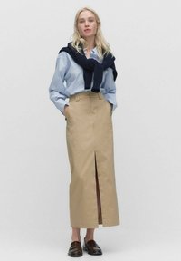 Юбка с накладными карманами