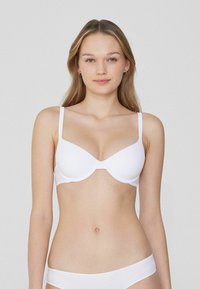 Бюстгальтер на косточках Бюстгальтер на косточках