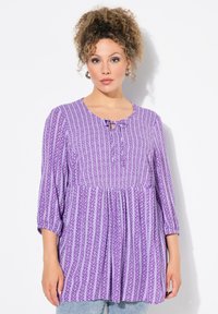 Длинная блузка