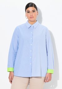 Длинная блузка Длинная блузка