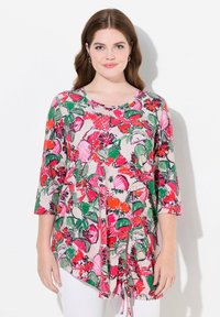 Длинная блузка