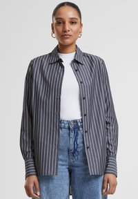 Длинная блузка