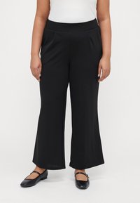 Широкие брюки Широкие брюки