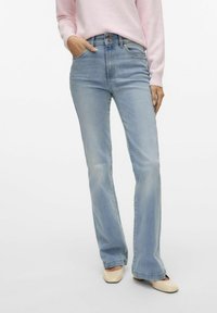 Клешеные джинсы Клешеные джинсы